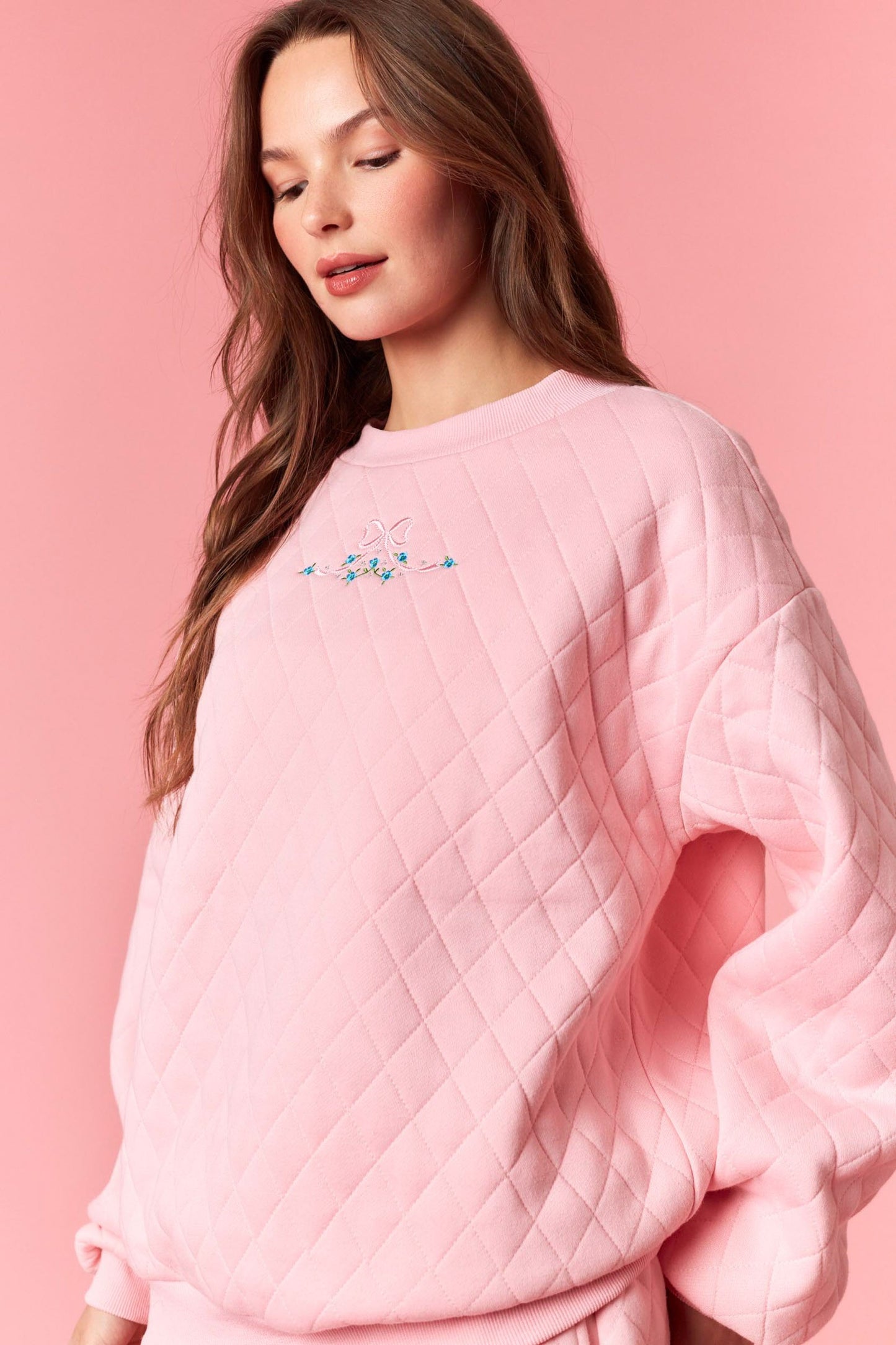 paris bow quilted crewneck