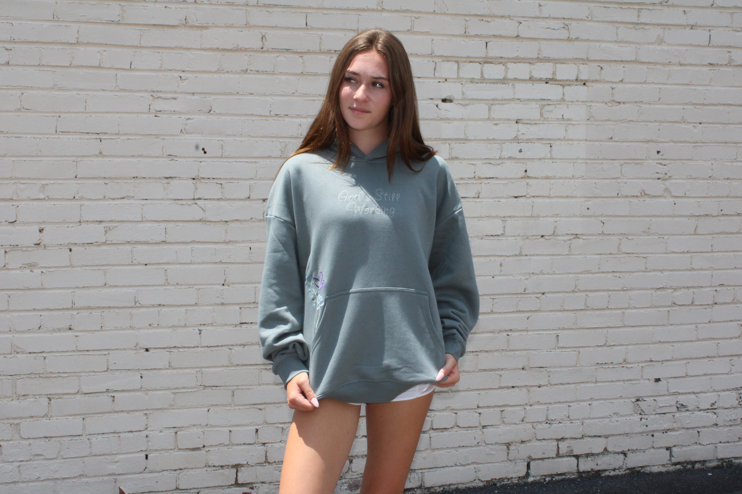 God's still working hoodie