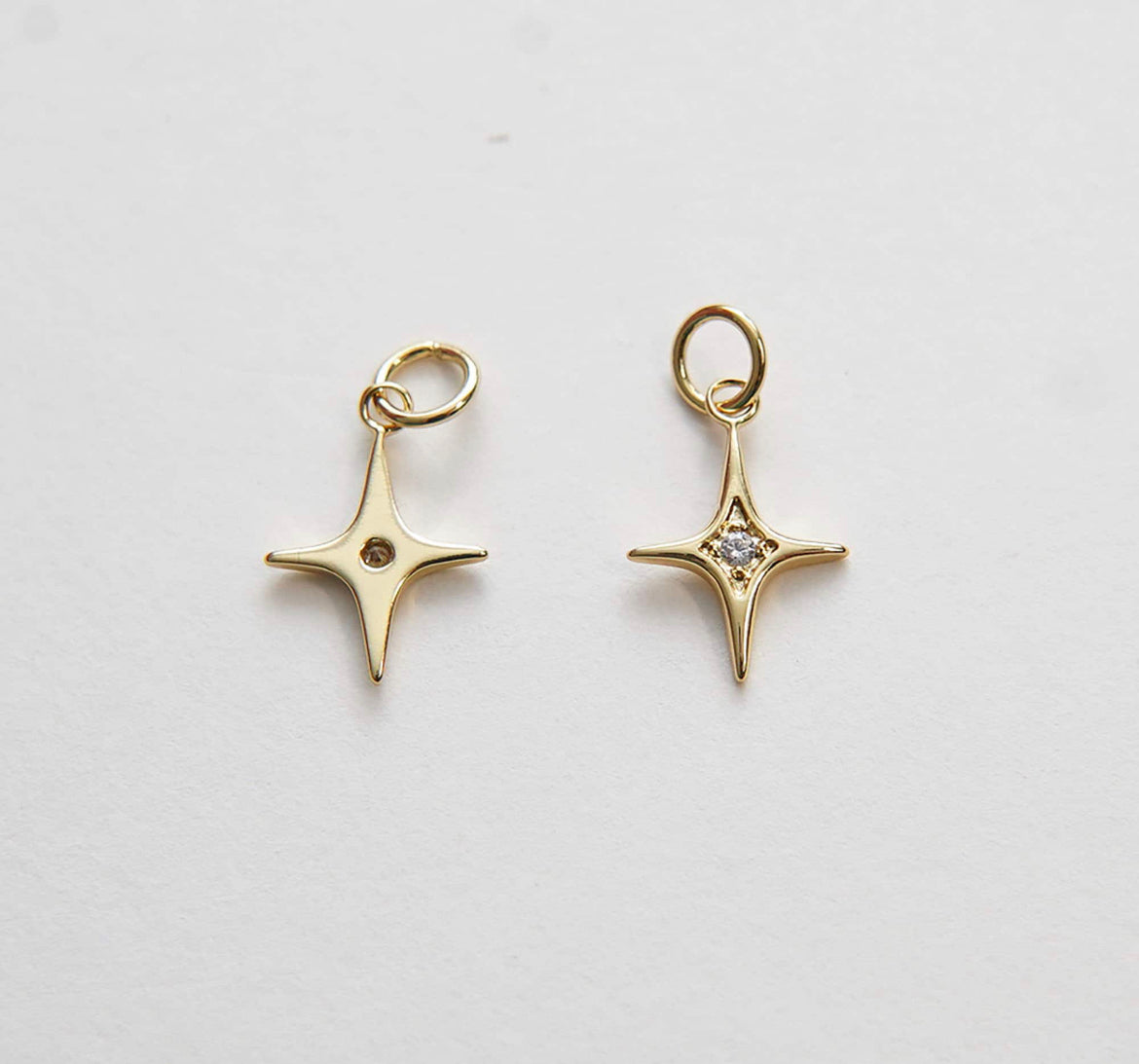 gold starburst charm