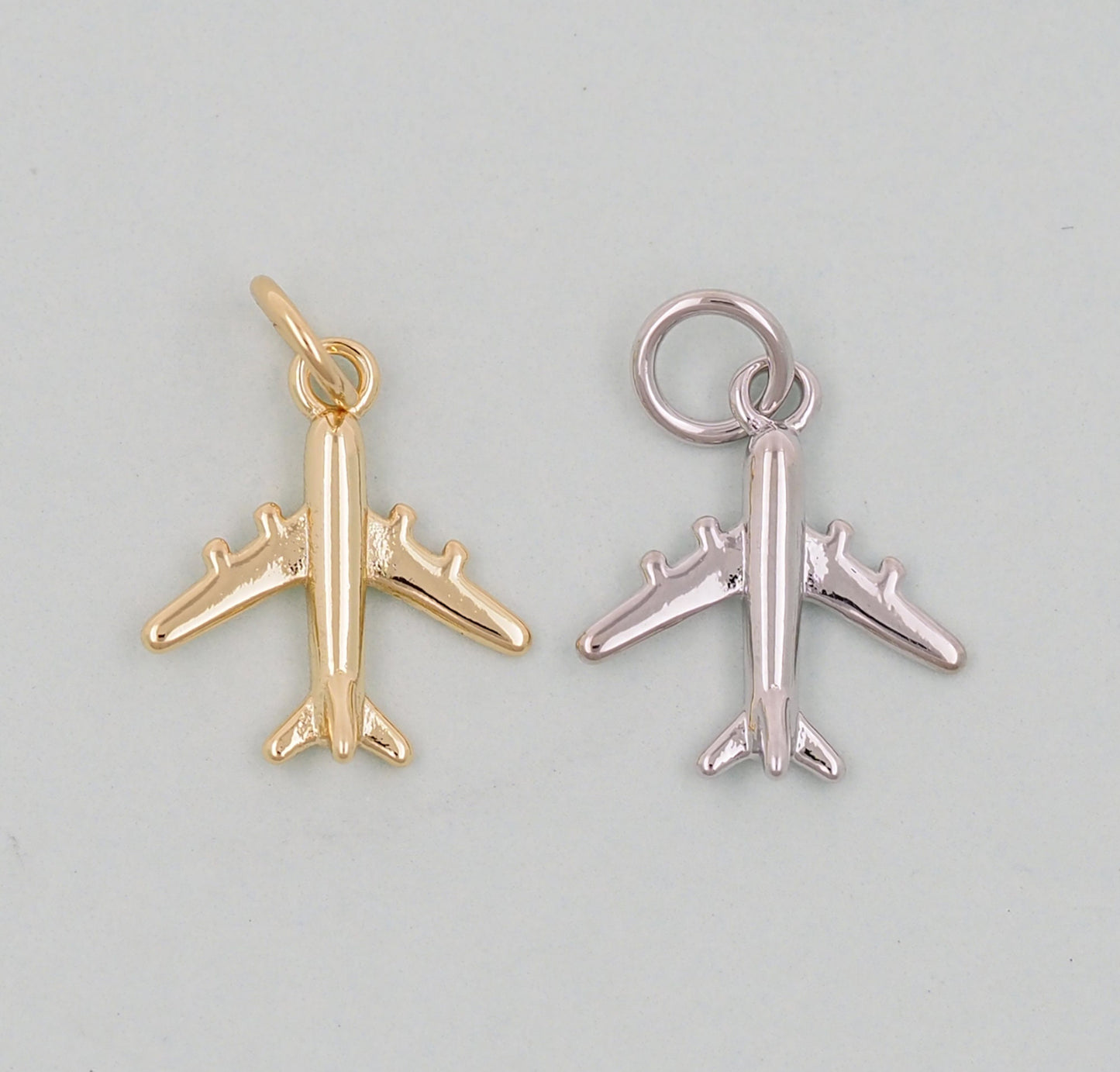 gold airplane charm