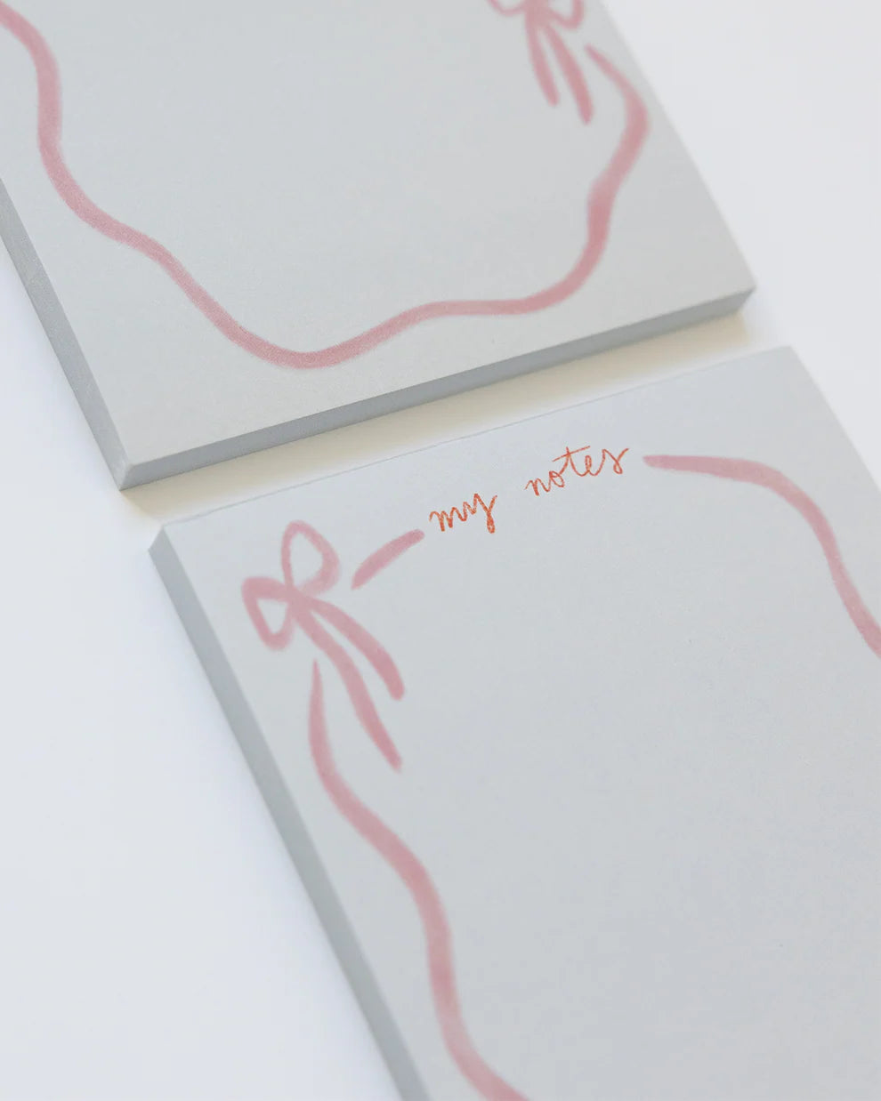 pink ribbon bow notepad