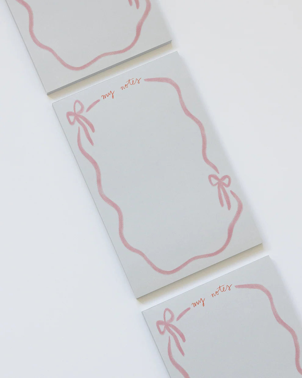 pink ribbon bow notepad